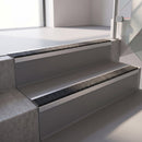 Square edge with ramped back aluminium stair nosing, 70mm tread, obsidian (dark charcoal) Mor Grip insert, mill finish finish