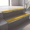 Square edge with ramped back aluminium stair nosing, 70mm tread, solar (golden yellow) Mor Grip insert, mirrorflect gold finish