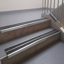 Square edge with ramped back aluminium stair nosing, 93mm tread, obsidian (dark charcoal) Mor Grip insert, bright polished finish