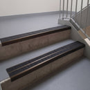 Square edge with ramped back aluminium stair nosing, 93mm tread, obsidian (dark charcoal) Mor Grip insert, dark bronze finish
