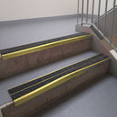 Square edge with ramped back aluminium stair nosing, 93mm tread, obsidian (dark charcoal) Mor Grip insert, mirrorflect gold finish