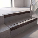 Square edge with ramped back aluminium stair nosing, 70mm tread, everest (light grey) exterior grip insert, dark bronze finish