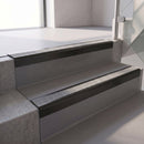 Square edge with ramped back aluminium stair nosing, 70mm tread, everest (light grey) exterior grip insert, satin black finish