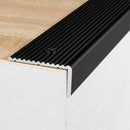 Black anodised aluminium ribbed stair nosing edge trim 40x20mm on a wooden step edge
