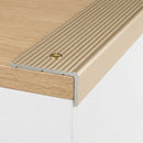 Champagne anodised aluminium ribbed stair nosing edge trim 40x20mm on a wooden step edge