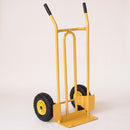 Yellow steel 200kg sack truck fitted with solid puncture proof wheels on yellow hubs, on a plain studio background