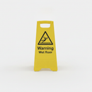 Yellow polypropylene A-frame floor warning sign printed WARNING WET FLOOR on a plain studio background