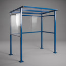 Traffic Blue RAL 5017 outdoor smoking shelter with clear twin-wall polycarbonate roof and side panels and bolted steel base plates on a plain grey studio background