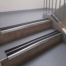 Square edge with ramped back aluminium stair nosing, 93mm tread, twin coal (black) exterior grip inserts, mill finish finish