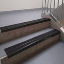 Square edge with ramped back aluminium stair nosing, 93mm tread, twin coal (black) exterior grip inserts, satin black finish