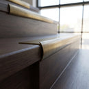 Solid Brass Bullnose Stair Nosing 45mm Tread 30mm Nose in antique brass finish fitted on a step edge