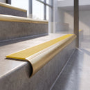 Solid brass raked back stair nosing - Canary Ridged PVC insert colour