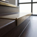 Solid Brass Stair Edge 45mm Tread Square Front Profile in antique brass finish fitted on a step edge