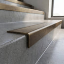 Solid Brass Stair Edge 45mm Tread Square Front Profile in antique bronze finish fitted on a step edge