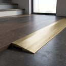 Solid Brass Stair Nosing 30mm Tread Ramp Feather Edge Profile in satin brass finish fitted on a step edge