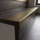 Solid Brass Stair Nosing 45mm Tread Raked Front Profile in antique bronze finish fitted on a step edge