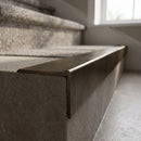 Solid Brass Stair Nosing 45mm Tread Square Front Profile in antique brass finish fitted on a step edge
