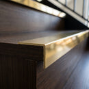 Solid Brass Stair Nosing 45mm Tread Square Front Profile in polished brass finish fitted on a step edge