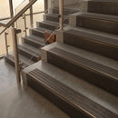 Antique Bronze finish with Granite Castellated insert - 59.5mm solid brass raked front single channel stair nosing fitted to a stone step