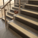 Antique Bronze finish with Ivory Castellated insert - 59.5mm solid brass raked front single channel stair nosing fitted to a stone step