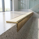 Solid Brass Stair Nosing 59.5mm Tread Raked Front Single Channel in antique brass finish fitted on a step edge