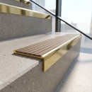 Solid Brass Stair Nosing 59.5mm Tread Square Front Profile in polished brass finish fitted on a step edge