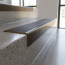 Solid Brass Stair Nosing 62mm Ribbed Tread Raked Back in antique bronze finish fitted on a step edge