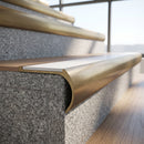 Solid Brass Stair Nosing 67.2mm Bullnose Profile with Infill in antique brass finish fitted on a step edge