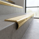 Solid Brass Stair Nosing 67.2mm Bullnose Profile with Infill in polished brass finish fitted on a step edge