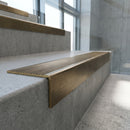 Solid Brass Stair Nosing 67mm Ribbed Tread Raked Front in antique bronze finish fitted on a step edge