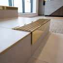 Solid Brass Stair Nosing 71mm Tread Square Front Slimline in Polished Brass finish with Antique Brass insert fitted on a modern office reception staircase with porcelain tile treads