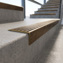Solid Brass Stair Nosing 71mm Tread Raked Back Profile in antique bronze finish fitted on a step edge