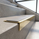 Solid Brass Stair Nosing 71mm Tread Raked Back Profile in polished brass finish fitted on a step edge