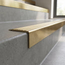 Solid Brass Stair Nosing 71mm Tread Square Front Single Channel in polished brass finish fitted on a step edge