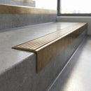 Solid Brass Stair Nosing 71mm Tread Square Front Slimline in antique brass finish fitted on a step edge