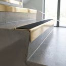 Solid Brass Stair Nosing 71mm Tread Square Front Slimline in polished brass finish fitted on a step edge