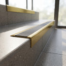 Solid Brass Stair Nosing 71mm Tread Square Front Slimline in satin brass finish fitted on a step edge