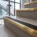 Solid Brass Stair Nosing 83mm x 55mm Ramped Heavy Duty with Carborundum Insert professionally fitted in use