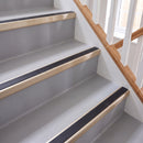 Square Aluminium Stair Nosing 2.44m | 46mm Tread | 25mm Ri in Satin Bronze finish fitted on a commercial stair