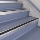 Square Aluminium Stair Nosing 2.75m 56mm Tread Single in Satin Silver finish fitted on a commercial stair