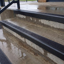 Square edge aluminium stair nosing with black gritted exterior grip insert in satin black finish fitted on covered external concrete steps