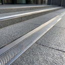 Stainless Steel Tactile Stair Nosing for Carpet and LVT Floors professionally fitted in use
