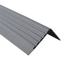 40x40mm flexible PVC angle stair nosing in dark grey, studio view showing the fluted tread face and plain riser face