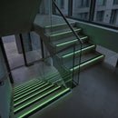57x55mm rake back stair nosing glowing green along each step edge in the dark during a power cut, no wiring or power needed