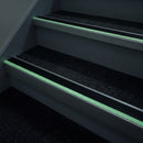 60x55mm stair nosing glowing green along each step edge in a dark stairwell during a power cut, no wiring or power needed