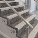 Square front aluminium stair nosings with pale cloud grey ribbed inserts on mottled stone steps