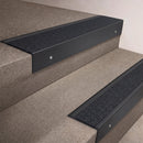 Black Anodised finish 66x55mm raked back aluminium stair nosing with a Black Olympic Grip insert, fitted to interior steps