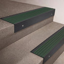 Black Anodised finish 66x55mm raked back aluminium stair nosing with a Spruce Castellated insert, fitted to interior steps