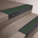 Black Anodised finish 66x55mm raked back aluminium stair nosing with a Spruce Castellated insert, fitted to interior steps
