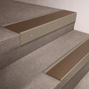 Light Bronze finish 66x55mm raked back aluminium stair nosing with a Bronze Aluminium insert, fitted to interior steps